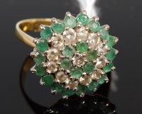 Lot 367 - An 18ct gold, emerald and diamond set flower...