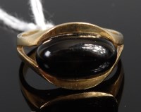 Lot 370 - An 8ct gold and black onyx set dress ring,...