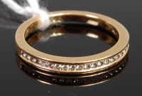Lot 371 - An 18ct gold and diamond half eternity ring,...