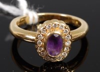 Lot 378 - A modern 18ct gold, oval cut amethyst and...
