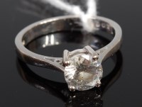 Lot 382 - An 18ct white gold diamond solitaire ring, the...