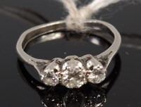 Lot 385 - A platinum diamond three stone ring, the...