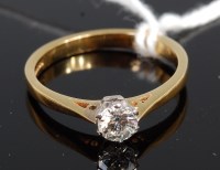Lot 399 - An 18ct gold diamond solitaire ring, the claw...