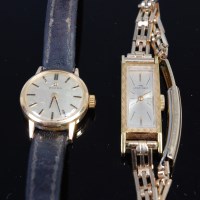Lot 423 - An Omega ladies gold plated wrist watch having...