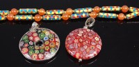 Lot 433 - Two Baccarat style glass pendants together...