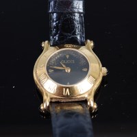 Lot 436 - A ladies Gucci wristwatch with Gucci leather...