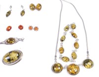 Lot 437 - A quantity of amber and hardstone set ear...