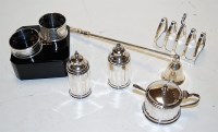 Lot 444 - A George V silver four division toast rack by...