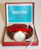 Lot 473 - A gents Baume 9ct gold cased wrist watch...