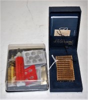 Lot 476 - A Du Pont of Paris gilt metal cased pocket...