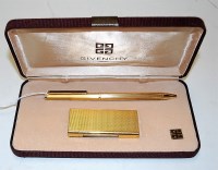 Lot 479 - A modern Givenchy textured gilt pocket...