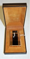 Lot 481 - A Du Pont of Paris gilt and Chinese lacquered...