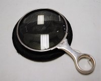 Lot 491 - A George V silver mounted magnifying glass