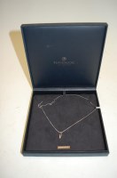 Lot 497 - A ladies 14ct gold and diamond set pendant on...