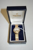 Lot 498 - A gents Tissot 9ct gold cased wrist watch...