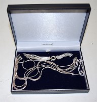Lot 501 - A ladies sterling silver seven string meshlink...