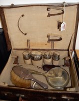 Lot 521 - A George V crocodile skin covered vanity case...