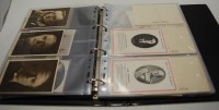 Lot 524 - Two albums of early 20th century postcards, to...