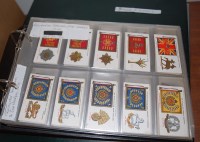Lot 534 - Two cigarette albums and contents, to include;...