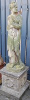 Lot 1323 - Reconstituted stone figure of a robed Diana in...