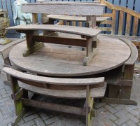 Lot 1326 - A contemporary slatted teak garden suite...