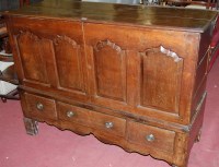 Lot 1351 - A converted antique joined oak mule chest,...