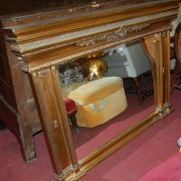 Lot 1352 - A reproduction French style gilt overmantel...