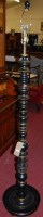 Lot 1268 - A contemporary ebonised and gilt heightened...