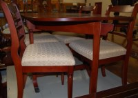 Lot 1291 - A reproduction mahogany dropleaf dining table,...