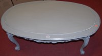 Lot 1293 - A French grey painted oval low coffee table,...