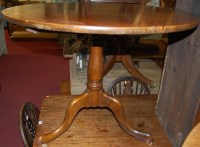 Lot 1303 - An oak circular pedestal tripod table, dia.91cm