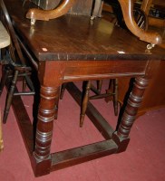 Lot 1304 - A joined mahogany refectory table, raised on...