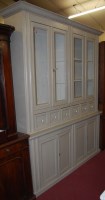 Lot 1307 - A large grey painted pine dresser, having four...