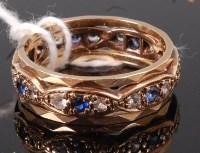 Lot 349 - A 9ct gold, sapphire and diamond set eternity...