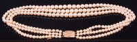 Lot 403 - A ladies faux pearl three string choker,...