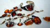 Lot 410 - A collection of assorted amber, silver and...