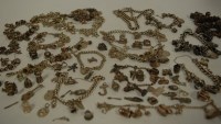 Lot 416 - A large collection of assorted silver charm...