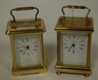 Lot 436 - A modern lacquered brass cased carriage clock,...