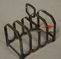 Lot 439 - A modern silver four division toast-rack