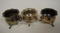 Lot 457 - An Edwardian silver three piece cruet set, to...