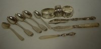 Lot 462 - Four various silver napkin rings; together...
