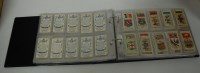 Lot 482 - An album of Players cigarette cards to include...