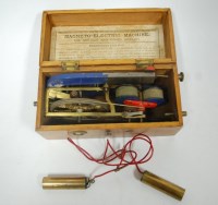 Lot 490 - A cased magneto electric shock machine