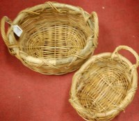Lot 572 - A graduated set of two wicker baskets