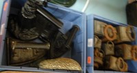 Lot 585 - Two boxes of cast effects to include scale...