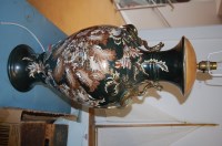 Lot 587 - A pair of large ceramic table lamps in the...