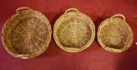 Lot 620 - A set of three graduated wicker baskets