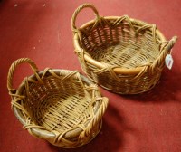 Lot 642 - A set of two graduated wicker baskets