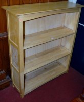 Lot 1073 - A modern beech and laminate open bookcase,...