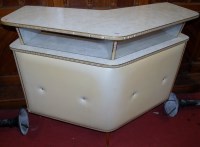 Lot 1075 - A 1950s cream padded vinyl clad bar, having...